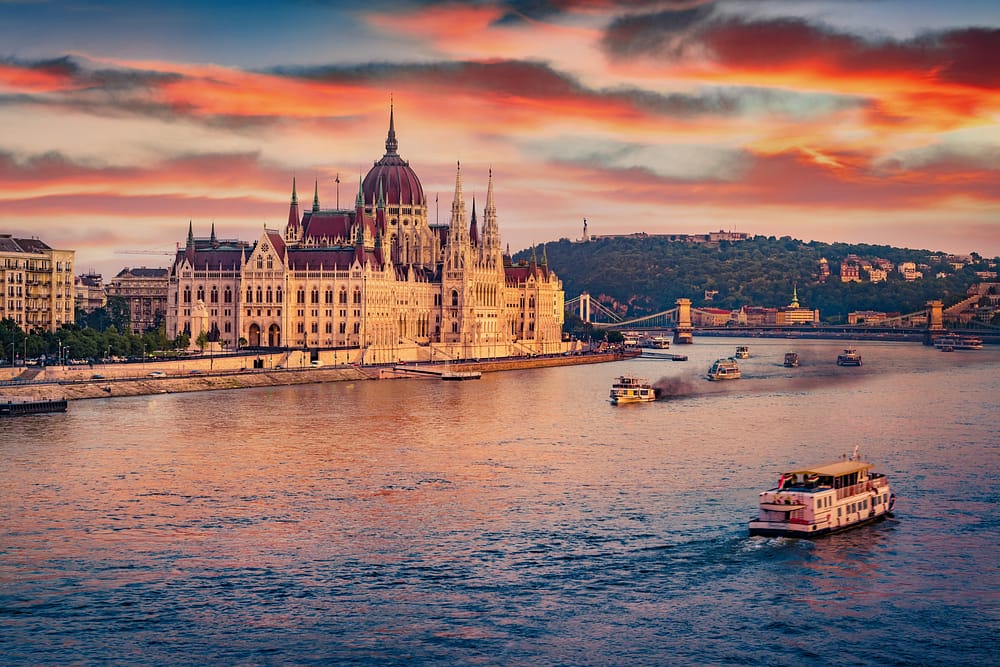 Parliament building near Danube river, sunset